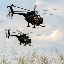 Rangers and 160th Special Operations Aviation Regiment soldiers rehearse infilling via MH-6 helicopters in July 2018.