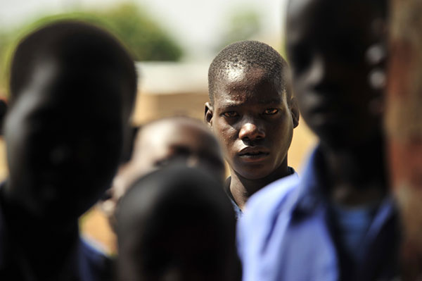 Ugandan choir students rehearse at the St. Theresa Secondary School in Lira, Uganda, 23 February 2009. The school&rsquo;s previous location in the nearby village of Alanyi had been attacked by the LRA in late 2002, resulting in the killing, abduction, and displacement of many innocent civilians.