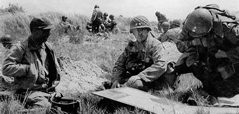 4th ID MG Raymond O. ‘Tubby’ Barton, BG Theodore Roosevelt, Jr. and the G-3 discuss division progress