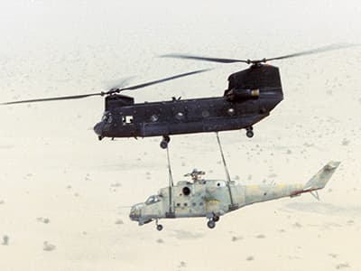 The Hind on its initial leg to Faya Largeau. This photo shows how well the Hind &lsquo;flew&rsquo; beneath the Chinook.