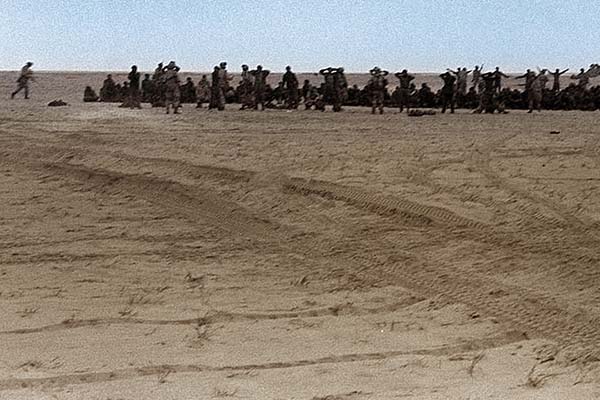 Iraqi soldiers surrender to U.S. Marines during Operation DESERT STORM in early 1991. In the preceding months, U.S. Army PSYOP loudspeaker teams had been attached to the Marines and other U.S. and coalition units for the purpose of encouraging enemy forces to cease resistance. (Image credit: NARA)