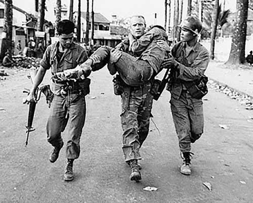 Smoke rises over Saigon, the capital of South Vietnam, following a Viet Cong attack during Tet Offensive in early 1968. (Image Credit: National Archives and Records Administration)