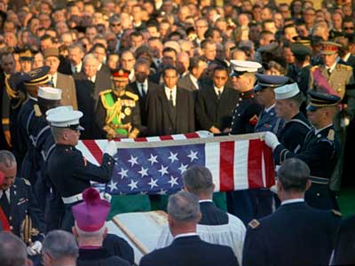 The American flag is folded near the end of the graveside service.