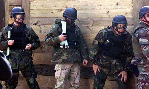 Actors Nikolaj Coster-Waldau, Eric Bana, and William Fichtner during explosive breaching training with 7th SFG at Fort Bragg.