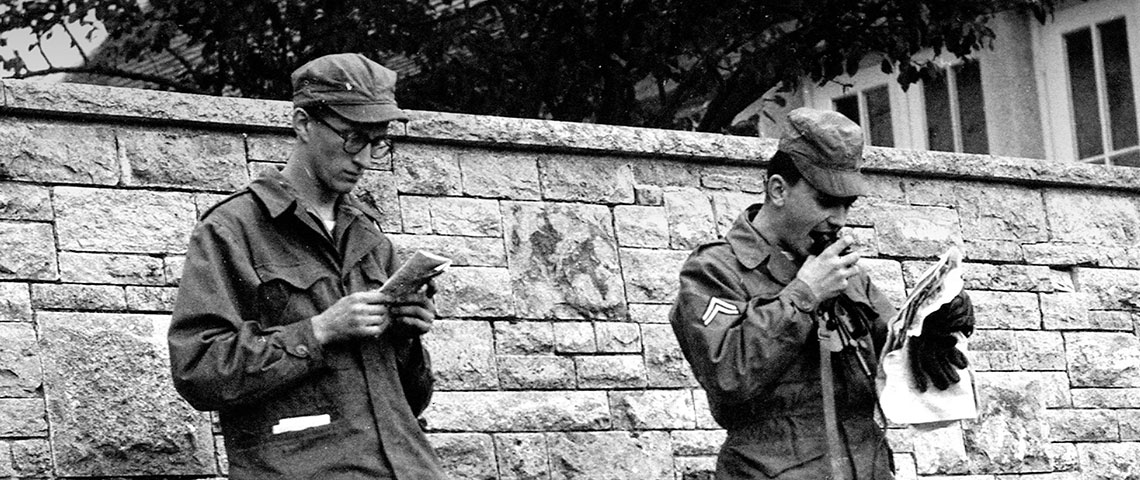 5th L&L Company: Germany 1951-52. Reading leaflets during field exercises in West Germany