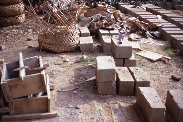 A goal of the 41st teams was to get the locals involved in projects, such as mixing concrete to form into blocks. After the concrete was mixed, it was put into forms and left to harden.