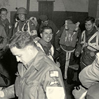 This photograph of OG ADRIAN illustrates the kind of insignia worn. Under and over the SF wing are U.S flags to identify the team clearly as American personnel. In order to be treated as combatants if captured, OG personnel always wore uniforms in the field.