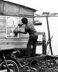 The JCRC &lsquo;Question Mark&rsquo; flyer was pasted on the wall of a grocery kiosk along a river bank.