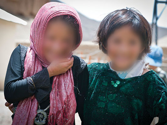Two local girls enjoying the Arzu Studio Hope Garden