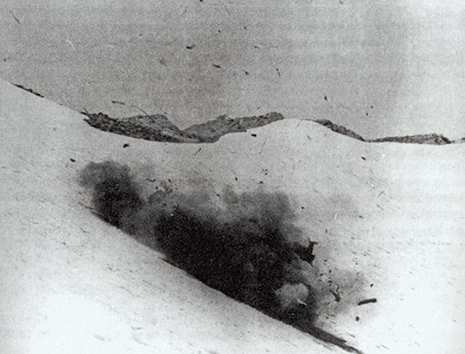 After being stripped of radios and remaining flight instruments, the U-1A Otter was blown to smithereens. It had been rigged with TNT, factored at &lsquo;P for plenty.&rsquo;