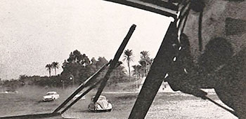 Belgian refugees drive towards helicopter