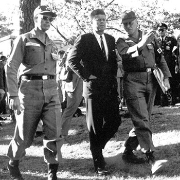 LTG Hamilton L. Howze, Commanding General, XVIII Airborne Corps, escorted President Kennedy from the reviewing area at McKellar&rsquo;s Pond.