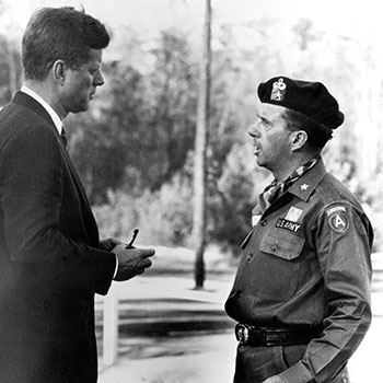 Brigadier General (BG) William P. Yarborough talked with President Kennedy following the 12 October 1961 special warfare demonstration at McKellar&rsquo;s Pond. The visit had been arranged by the president&rsquo;s aide-de-camp, Major General (MG) Chester V. &lsquo;Ted&rsquo; Clifton, a West Point &rsquo;36 classmate.