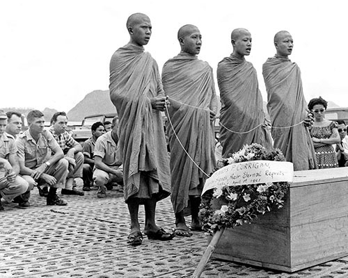 Buddhist monks pay respects to Frank Corrigan