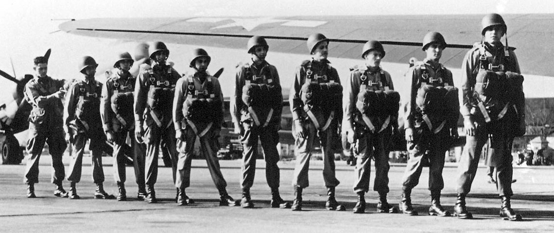 Camp Mackall riggers kept busy performing pre-jump checks for the hundreds of training jumps conducted at Camp Mackall in its two years as an airborne training center.