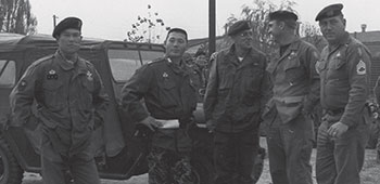 SFCs Burris, Spencer Gay, and Kilmer with ROKA SF Colonel and his SGM before an FTX.