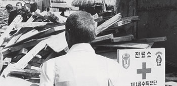 Temporary sign advertising the joint SFDK/ROKA SF MEDCAP exercise.