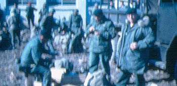 SFC Page and SSG Flowers enjoying another C-Ration meal before going to the field in the winter with the ROKA Special Forces.