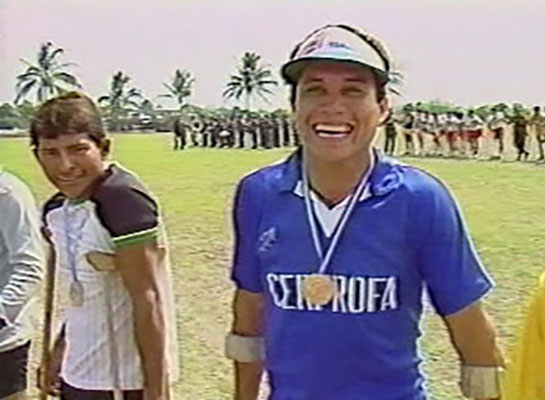 CENPROFA Hospital Militar player smiling proudly after receiving the first victory medals awarded amputee soccer players in El Salvador.