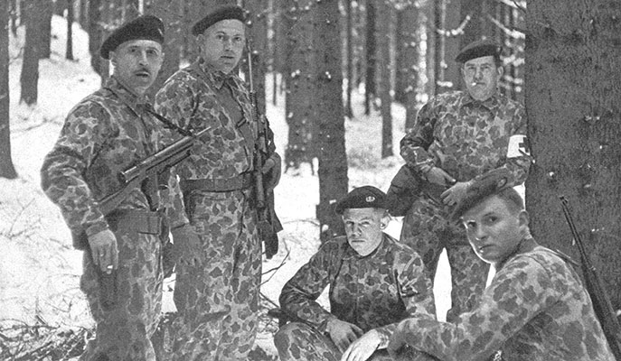 Captain Brucker with several of his Special Forces team