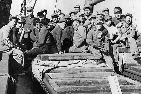 Sergeant First Class Walter Hoffman with both Korean trawler crews aboard K-444.