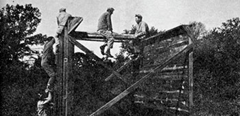 Getting a team over two walls with only a board