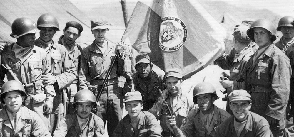 Batallón Colombia soldiers gathered after memorial service for their Old Baldy dead in April 1953.