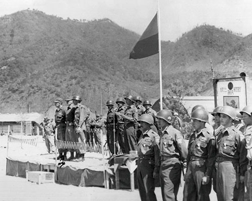 Batallón Colombia award ceremony for Operations BARBULA and Old Baldy. Note the Colombian &ldquo;Rampant Lion of Infantry&rdquo; sign to the right.