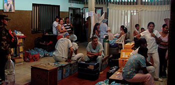 The MEDRETE makes the maximum use of space with the available facilities. This is a combination waiting room, equipment storage, break area, and behind the curtain, medical screening.