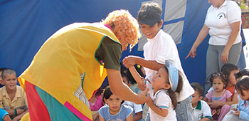 Not all of the children appear to enjoy the clowns.