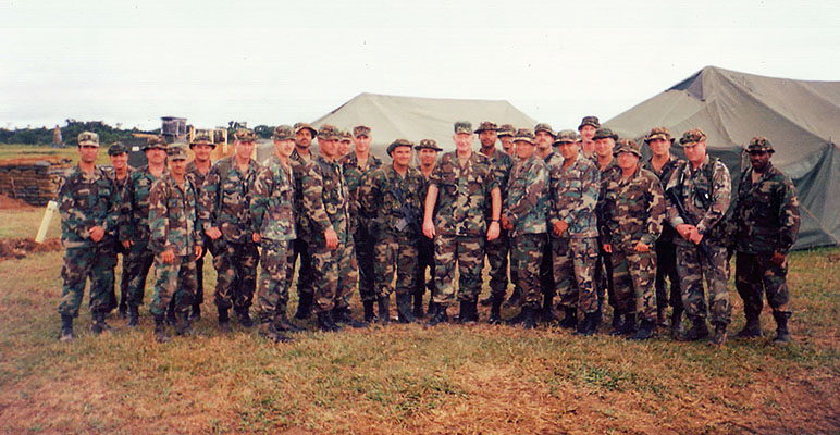 Members of A Company, 2/7th SFG in Tres Equinas take a break from training during a command visit by the Commanding General U.S. Army Special Forces Command, Major General Geoffrey Lambert.