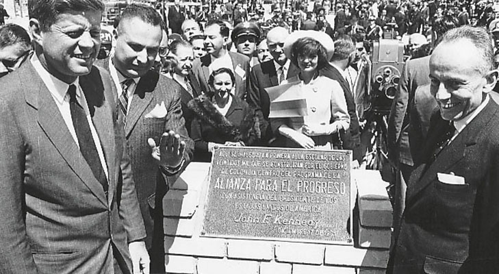 President John F. Kennedy with President Alberto Lleras Camargo at an Alliance for Progress school dedication in Bogotá.