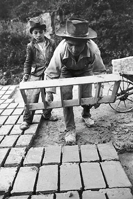 Alliance for Progress-funded adobe brick-making factory.