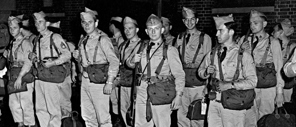 Troops line up ready for departure on 12 July 1951.