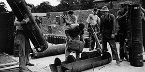 Gasoline being packed in type “C” containers. Notice the brick revetting walls.