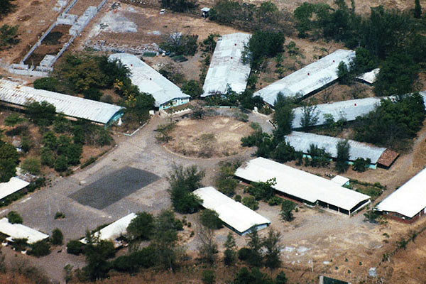 The central area of the San Miguel cuartel looked like a rimless wagon wheel missing some spokes. Outside that &ldquo;wheel&rdquo; were defensive trenches, guard towers, and some sandbag bunkers surrounded by an inner barbed-wire fence.