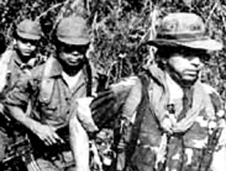 Lieutenant Colonel Domingo Monterrosa, former commander of BIRI Atlacatl (in the lead), took command of the 3rd Brigade in December 1983. The third soldier in line was Monterrosa&rsquo;s body guard, Soldado Juan Antonio Gómez.