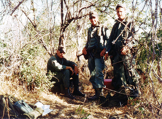 Sergeant David Janicki, Staff Sergeant Peter Moosey, and Sergeant Kenneth Beko at an FMLN campsite whose occupants received an early &ldquo;wake up call&rdquo; from a  Cazador range clearing patrol.
