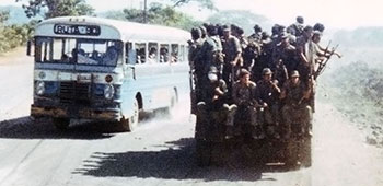 3rd Brigade Cazadores en route to training practice typical vehicle security measures.