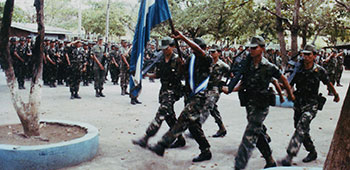 Ponce Cazador Battalion passes in review after completing six-weeks of training by ODA-7.