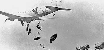 Paratroopers jump at Camp Mackall during training.