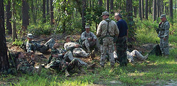 PSYOP students take a rest break after a roadmarch. In 10 minutes this group will enter phase II, the SURF.