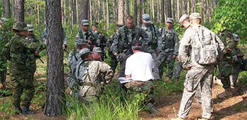 A group of PSYOP students has just completed a series of road marches to stress them physically and mentally before beginning Phase II of the exercise. 