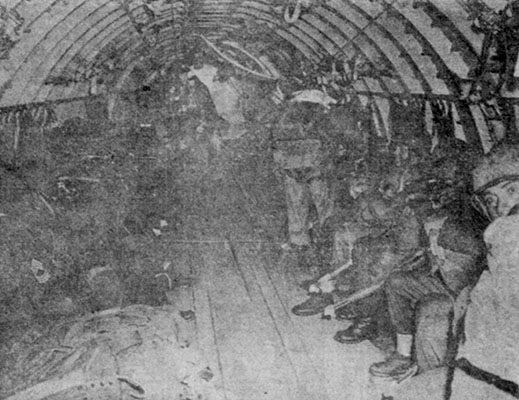 Salvadoran Ranger students aboard an Air Commando C-46 enroute to Río Hato to raid an aggressor headquarters to capture a senior officer as part of their field training.