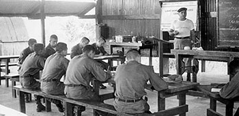 MSG Pedro &ldquo;Pete&rdquo; Sanchez, ODA-3, teaches the proper use of land mines to the Salvadoran Ranger students on Banana Island in Lake Gatun.