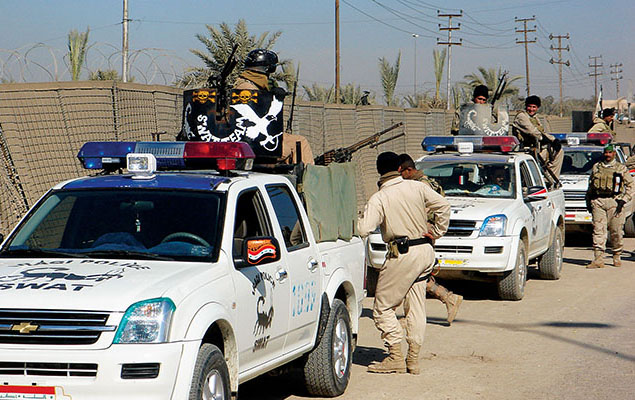 The Hilla SWAT traveled in Chevrolet Crew Cab 4x4, pickup trucks with pedestal-mounted PKM light machineguns.