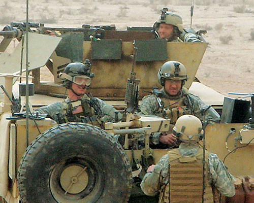 ODA 563 and Iraqi Hilla SWAT police prepare to enter the contact area on 28 January 2007 during the two-day Battle of An Najaf.