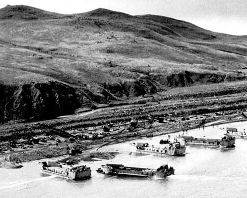 Allied forces landing after the First Special Service Force had secured the beaches.