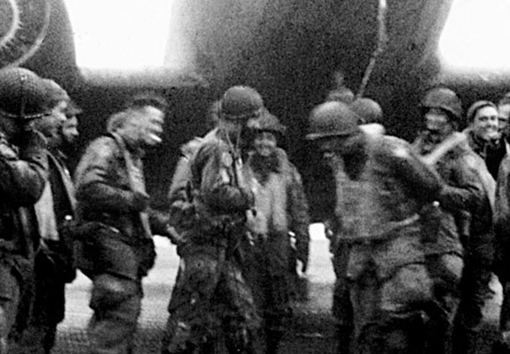 Men of the Second Regiment on Amchitka wait beneath their C-47 aircraft. The Second Regiment was the Force reserve and was prepared to conduct a parachute assault onto Kiska to reinforce the invasion.