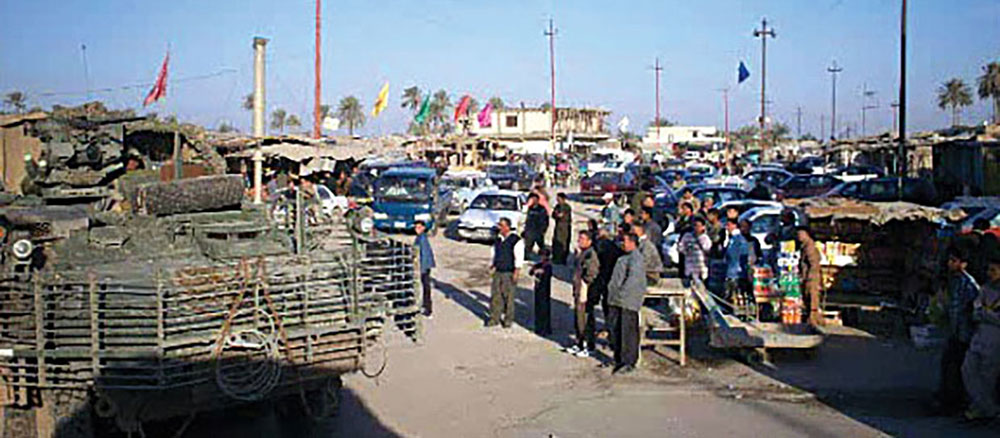 Strykers encountering Ashura crowds in Hilla.